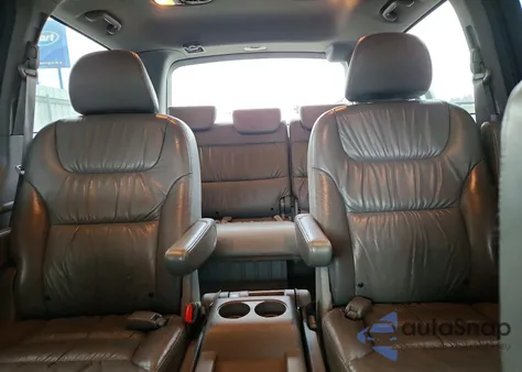 2010 Honda Odyssey Touring z USA, uszkodzony, nr VIN 5FNRL3H92AB107332